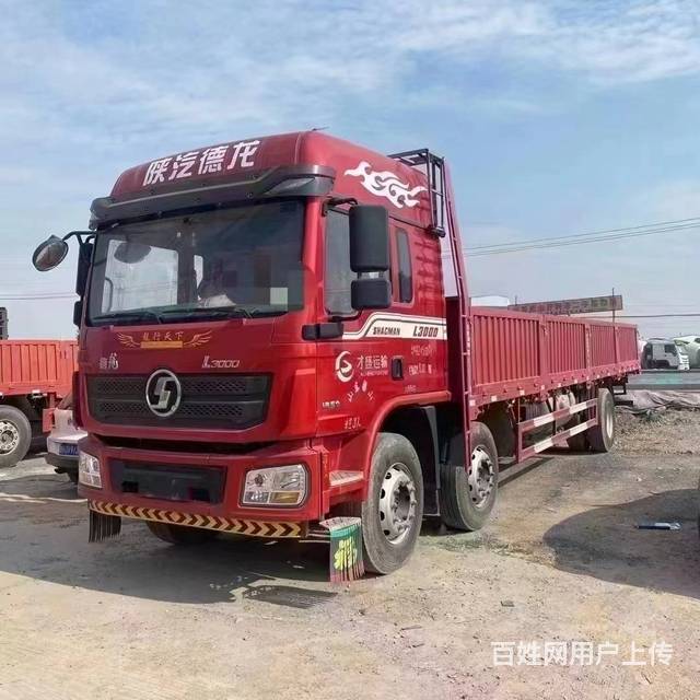 个人二手德龙前四后四9.6米平板载货车300马力的图片
