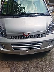 五菱荣光1.5排量九座一手车