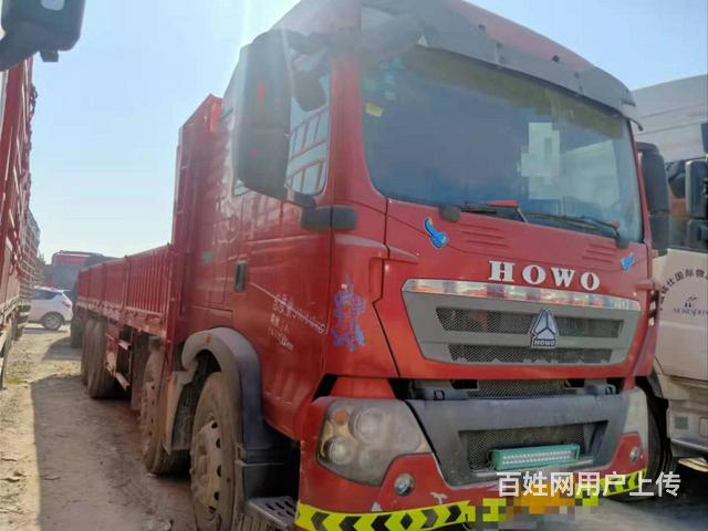 国四前四后八平板车340马力8米6货厢豪沃的图片