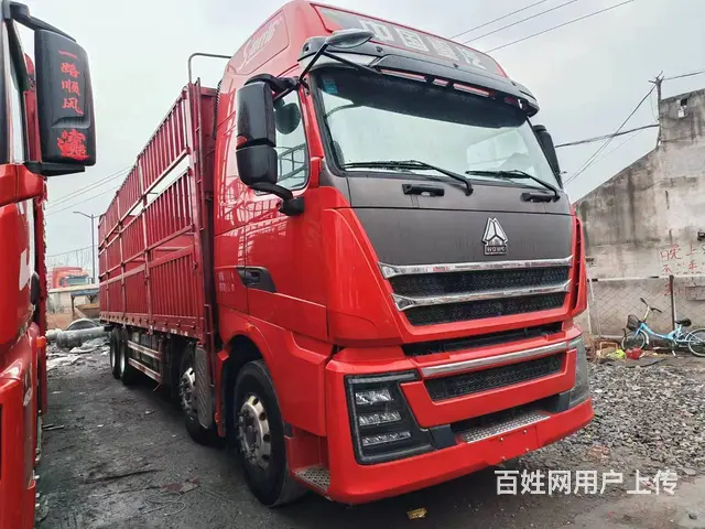 转入一台二手9.6米高栏重汽豪沃TH7前四后八国六 - 图片 1
