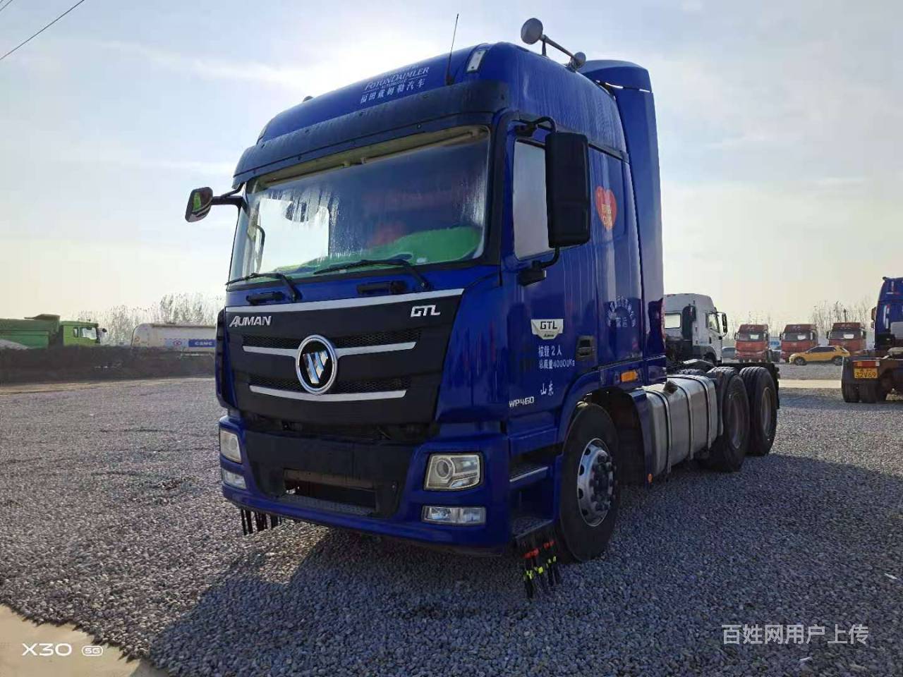 二手欧曼460马力牵引车双驱轻体国五排放